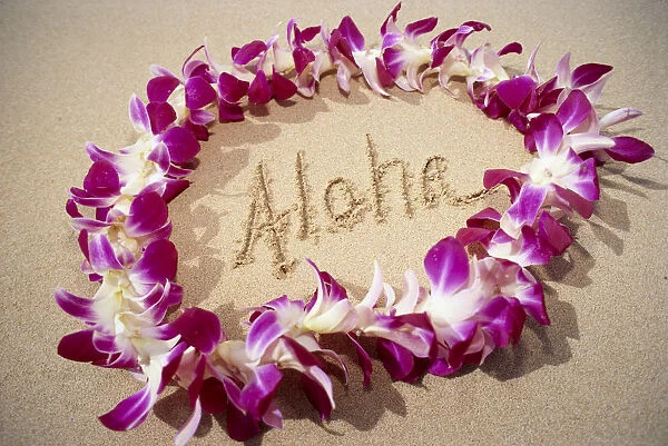 Hawaii, Close-Up Detail Of Purple Orchid Lei On Beach Aloha Written In Sand C1445