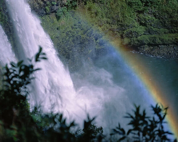 Hawaii, Kauai, View Looking Down Wailua Falls With Rainbow Arching Across Into Water