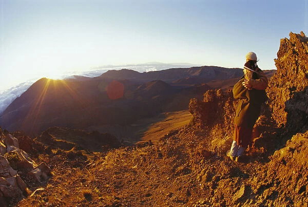 Hawaii, Maui, Haleakala Crater, Couple Embrace At Summit Watch Sunrise Stand On Rim Bright Sunlight Sunrays