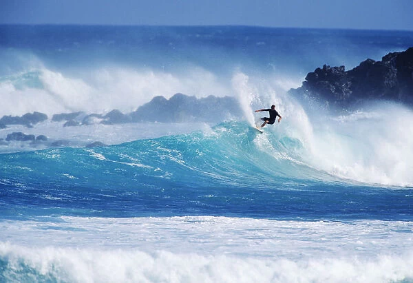Hawaii, Maui, Hookipa Beach Park, Pavillions, Surfer Carving Top Of Wave