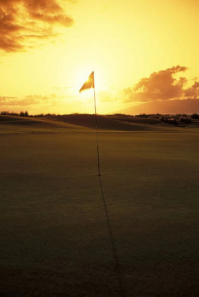 Hawaii, Maui, Kapalua Golf Club Plantation Course, 4Th Hole Flag At Sunset