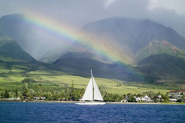 Hawaii, Maui, Lahaina, Rainbow In Front Of West Mauis Mountain Range With Sailboat In Ocean
