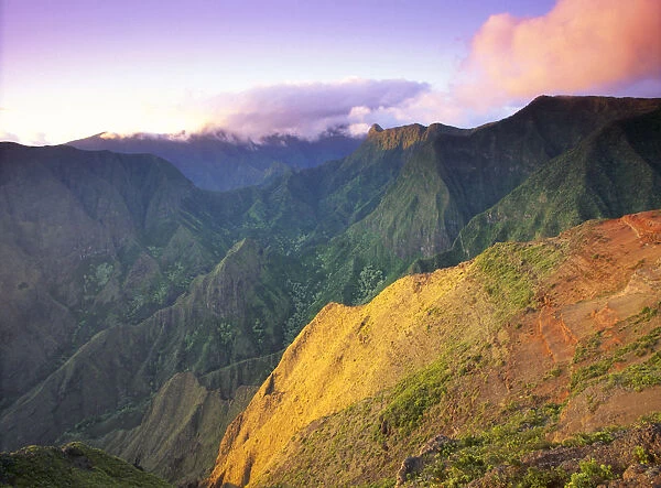 Hawaii, Maui, Ukumehame Gulch And West Maui Mountains At Sunset, Orange Cloud, With Green Mountains In Background