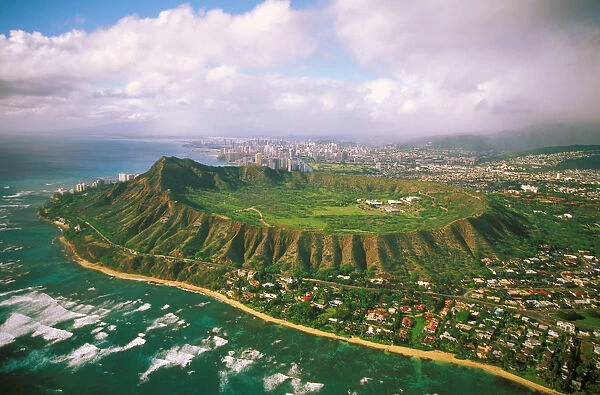 Hawaii, Oahu, Aerial Of Diamond Head Crater With Coastline View, Kahala Homes Foreground And Waikiki Hotels Background