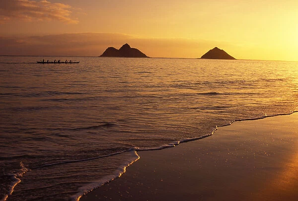 Hawaii, Oahu, Mokulua Islands, Outrigger Canoe Paddlers Off Lanikai Beach At Sunrise