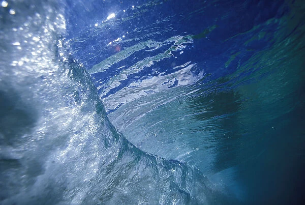 Hawaii, View Of A Wave From Underwater Looking At Surface Down The Curl