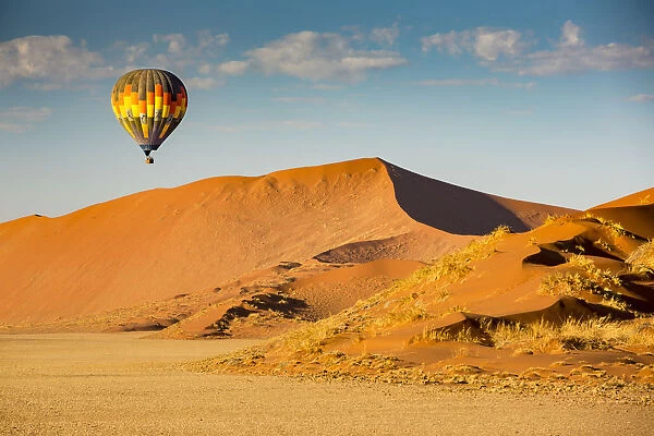 Hot air balloon ride over the red sand dunes of Sossusvlei in Namibia
