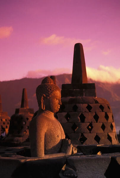 Indonesia, Java, Borobudor Temple And Buddha Statue At Sunrise, Pink Misty Sky