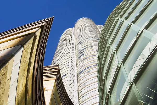 Japan, Roppongi Hills; Tokyo, Upward View Of Mori Tower Framed By Glass And Stone Of Lower Structures