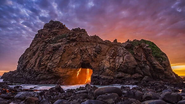 Keyhole Rock at sunset, on Pfeiffer Beach, which is along the Big Sur coast of California, USA