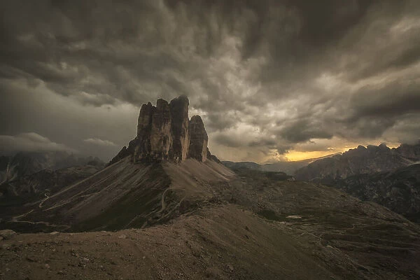 A Large Thunderstorm Looms Over Tre Cime In Natural Park Tre Cime In The Italian Dolomites; Cortina, Italy