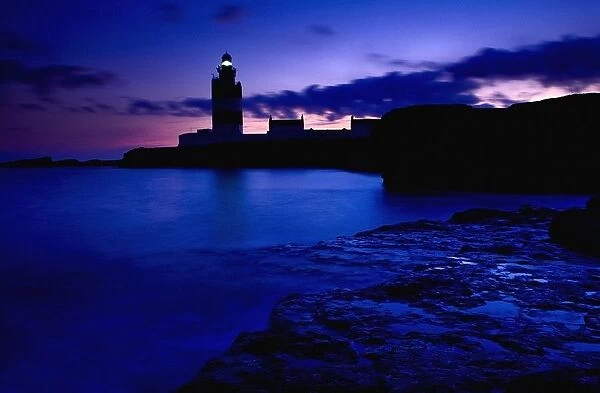 Lighthouse Beacon At Night