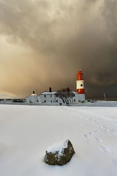 A Lighthouse And Building In Winter; South Shields, Tyne And Wear, England