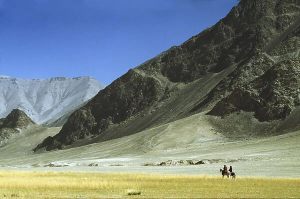 Local Horsemen In Pamirs Mountains, Xinjiang, China