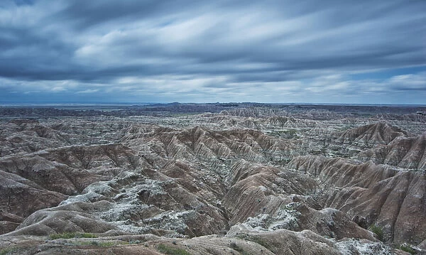 Long exposure of clouds overtop of badlands national park; south dakota united states of america
