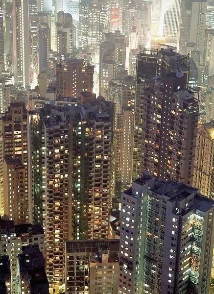 Looking Down On Crowded Residential And Office Tower Blocks As Seen From The Peak At Dusk