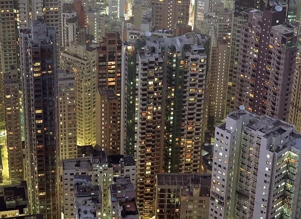 Looking Down On Crowded Residential Tower Blocks As Seen From The Peak At Dusk