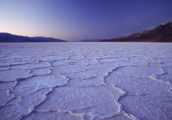 Looking Across The Purple Saltpans At Badwater At Dusk