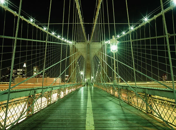 Looking Along Walkway On The Brooklyn Bridge At Night