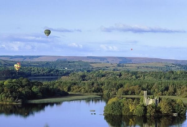 Lough Key Forest And Activity Park, Boyle, Co Roscommon, Ireland; Hot Air Balloons Flying Over A Park