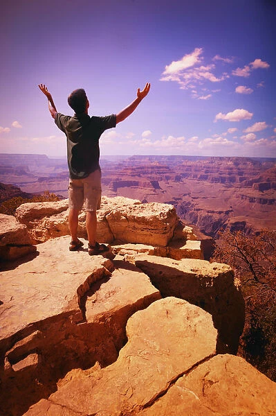 Man Worshipping Outside, Grand Canyon, Arizona, Usa