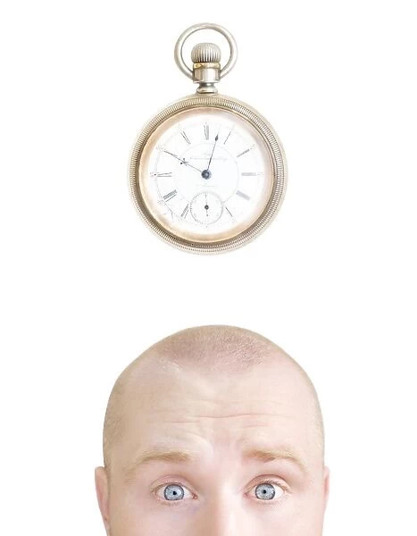 Part Of A Mans Head And A Stop Watch