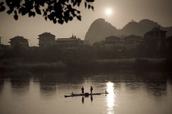 Men On A Raft Fishing; Guangxi Zhuang, China