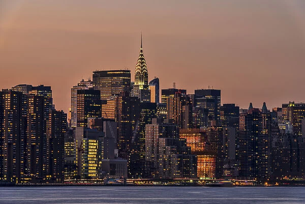 Midtown Manhattan Skyline At Sunset; New York City, New York, United States Of America
