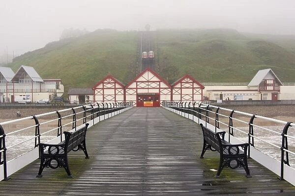 Misty View Of Victorian Pier; Redcar, North Yorkshire, England, Uk