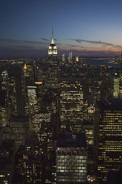 New York City Buildings Illuminated At Nighttime; New York City, New York, United States Of America