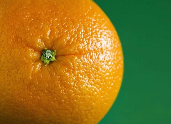 Orange Fruit On Green Background