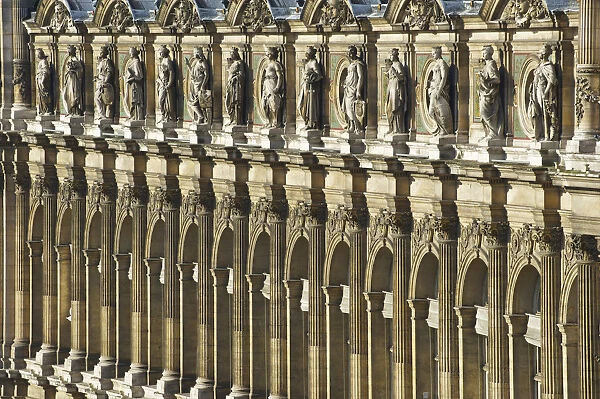 Ornate Facade Of A Building With Columns And Statues Of Men In A Row; Paris, France
