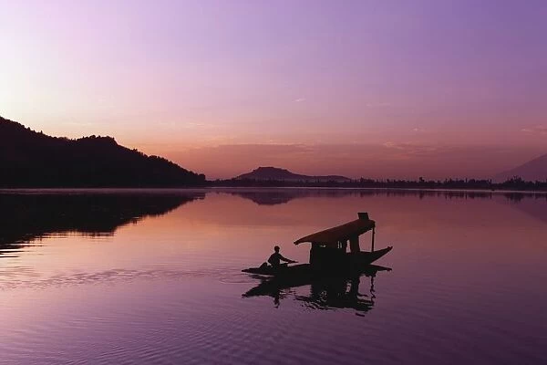 Person In A Boat On A Lake