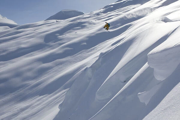 Professional Snowboarder, Frederik Kalbermatten, Heli Boarding In The Mountains Above Haines, Southeast Alaska