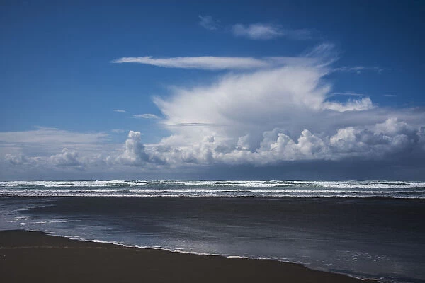 A Rain Shower Passes Near The Beach; Seaside, Oregon, United States Of America