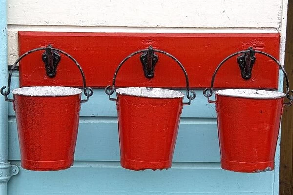 Three Red Buckets