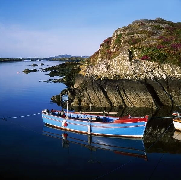 Roaringwater Bay, Co Cork, Ireland; Boat Near The Shore With Clear Island In The Background
