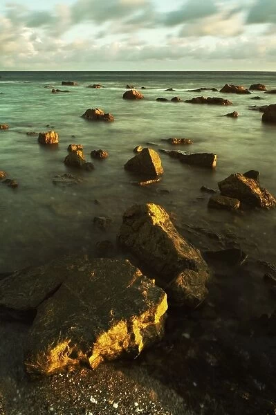 Rocks In Shallow Water By The Shore