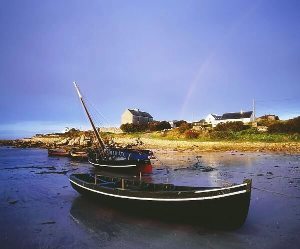 Roundstone, Connemara, County Galway, Ireland; Boats In Harbour With Rainbow