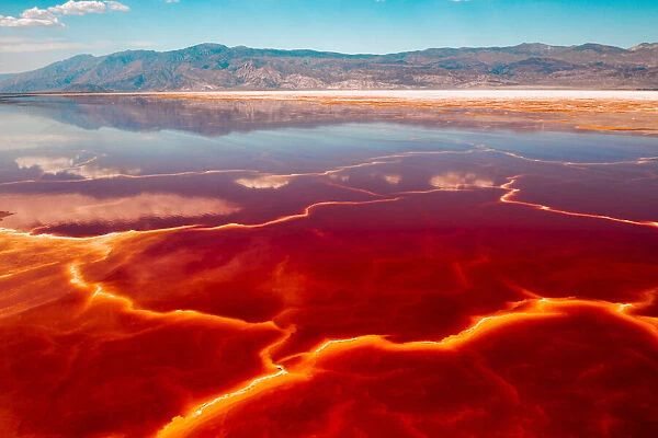Salt loving halobacteria turns a shallow lake bed red, Lone Pine, California, USA