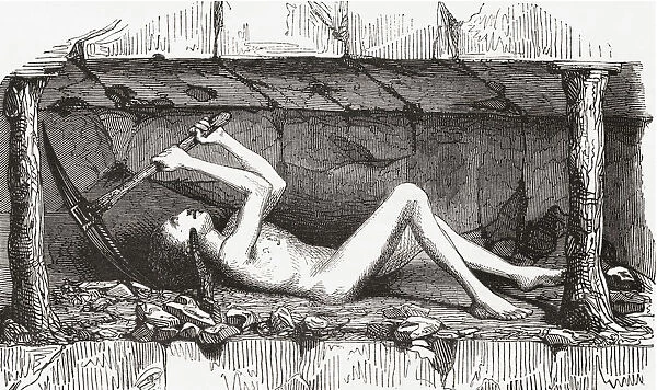 Scene Inside An English Coal Mine, Early 19th Century. A Young Man Extracting Coal From The Mine Face. From Le Magasin Pittoresque, Published 1843