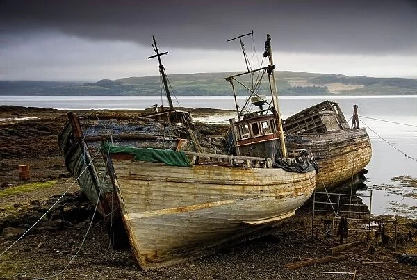 Scotland; Three Boats On Shore