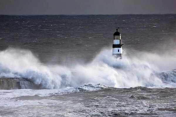 Seaham, Teesside, England; Waves Crashing On Lighthouse