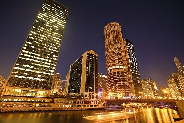 Skyscrapers Along Chicago River At Night