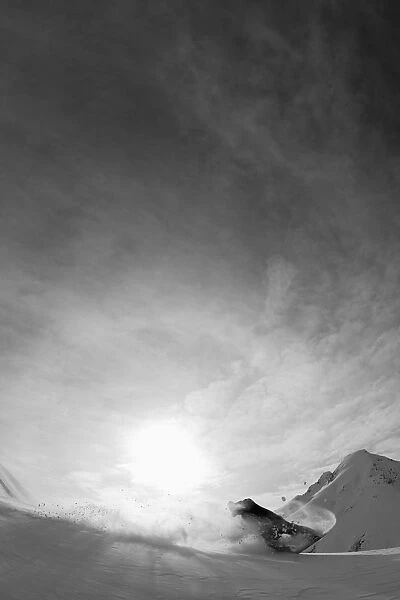 Snowboarding On The Snow Covered Mountains; Haines, Alaska, United States Of America