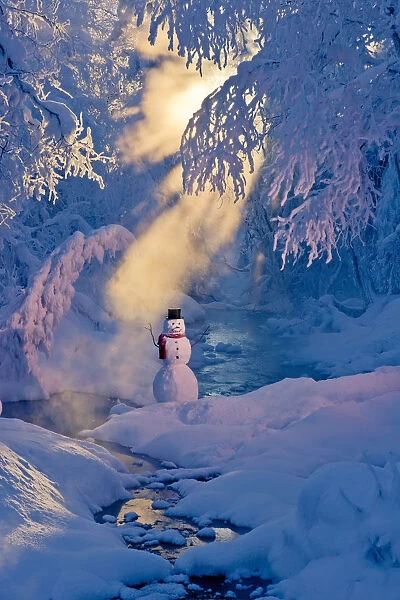 Snowman Standing Next To A Stream With Sunrays Shining Through Hoar Frosted Trees In The Background, Russian Jack Springs Park, Anchorage, Southcentral Alaska, Winter. Digitally Enhanced