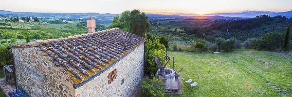 A Stone House And A View Of The Lush Landscape At Sunset, Villa Capanuccia; Florence, Italy
