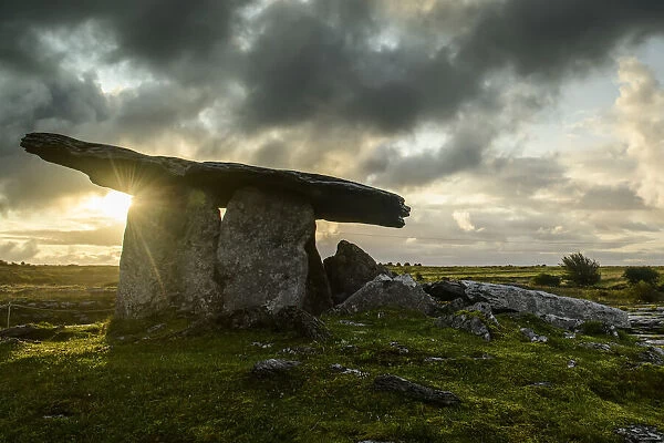 Sunrise at Poulnabrone dolmen stone in the Burren, County Clare, Ireland