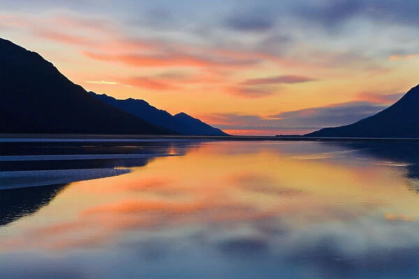 Sunset Colors Reflected In The Waters Of Turnagain Arm During Fall In Southcentral Alaska