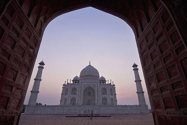 The Taj Mahal At Dusk As Seen Through Arch